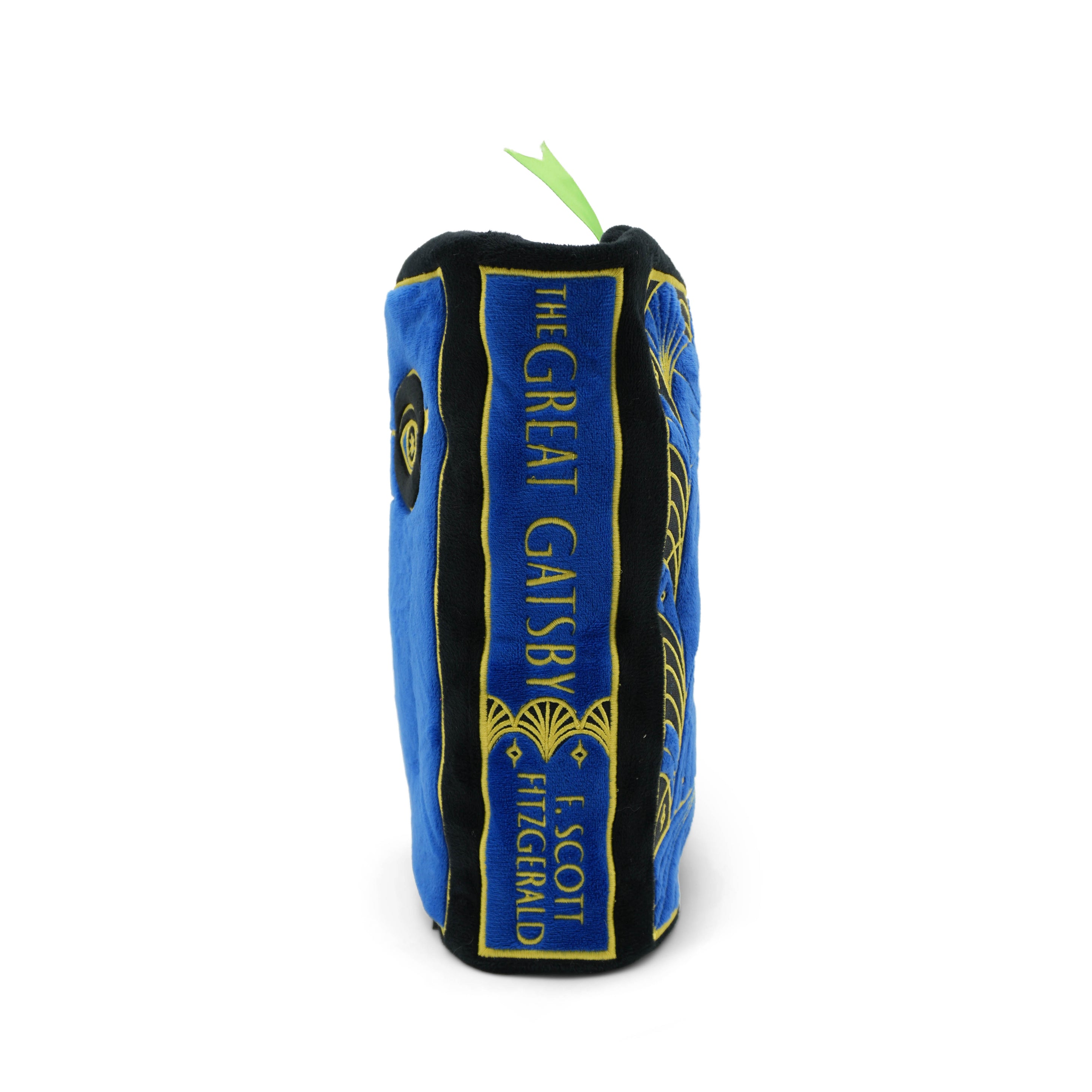 Blue and black plush resembling a book spine with 'The Great Gatsby' text on a white background