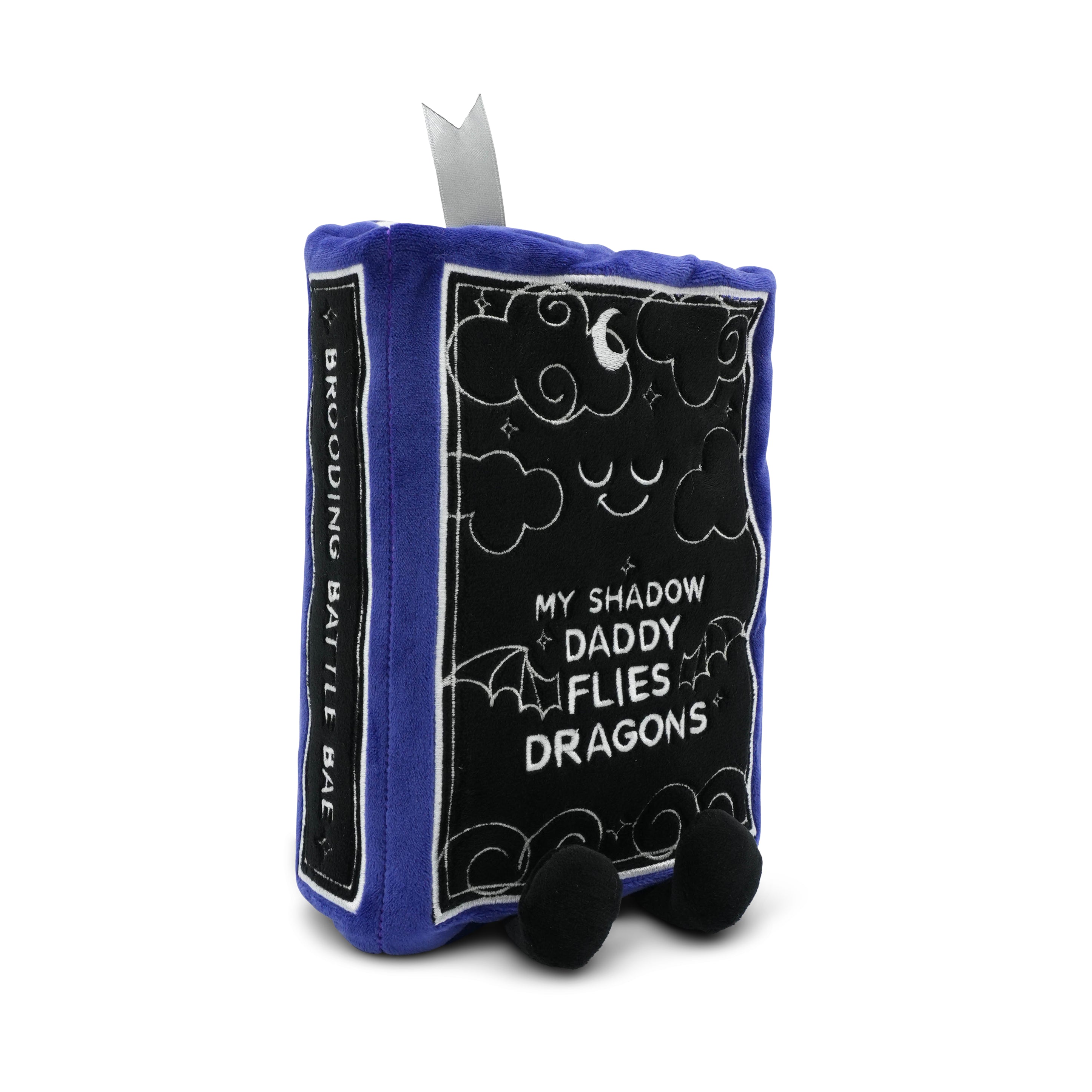 Plushie resembling a book with text on a white background
