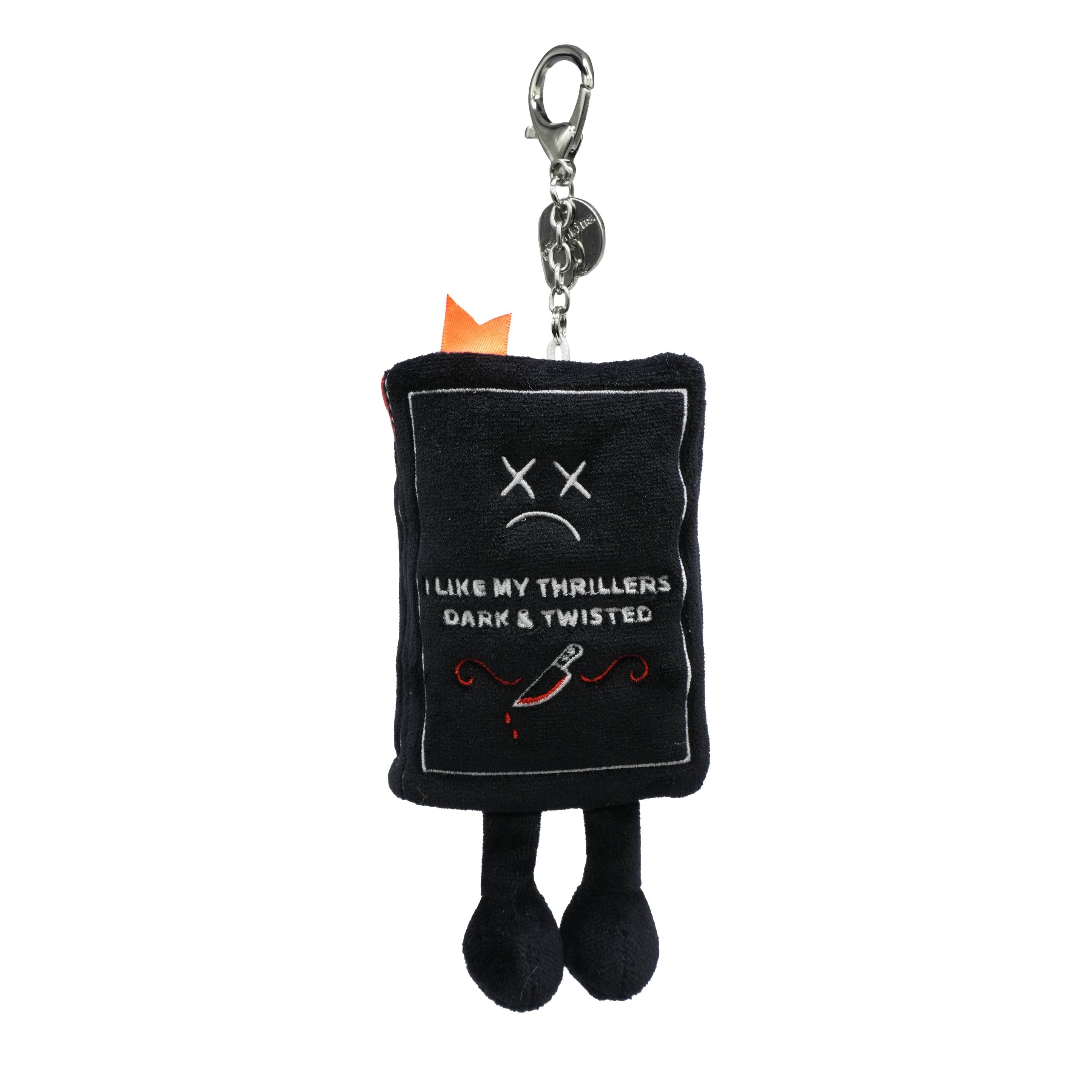 Black plush book keychain with the phrase 'I like my thrillers dark & twisted' written on it on a white background