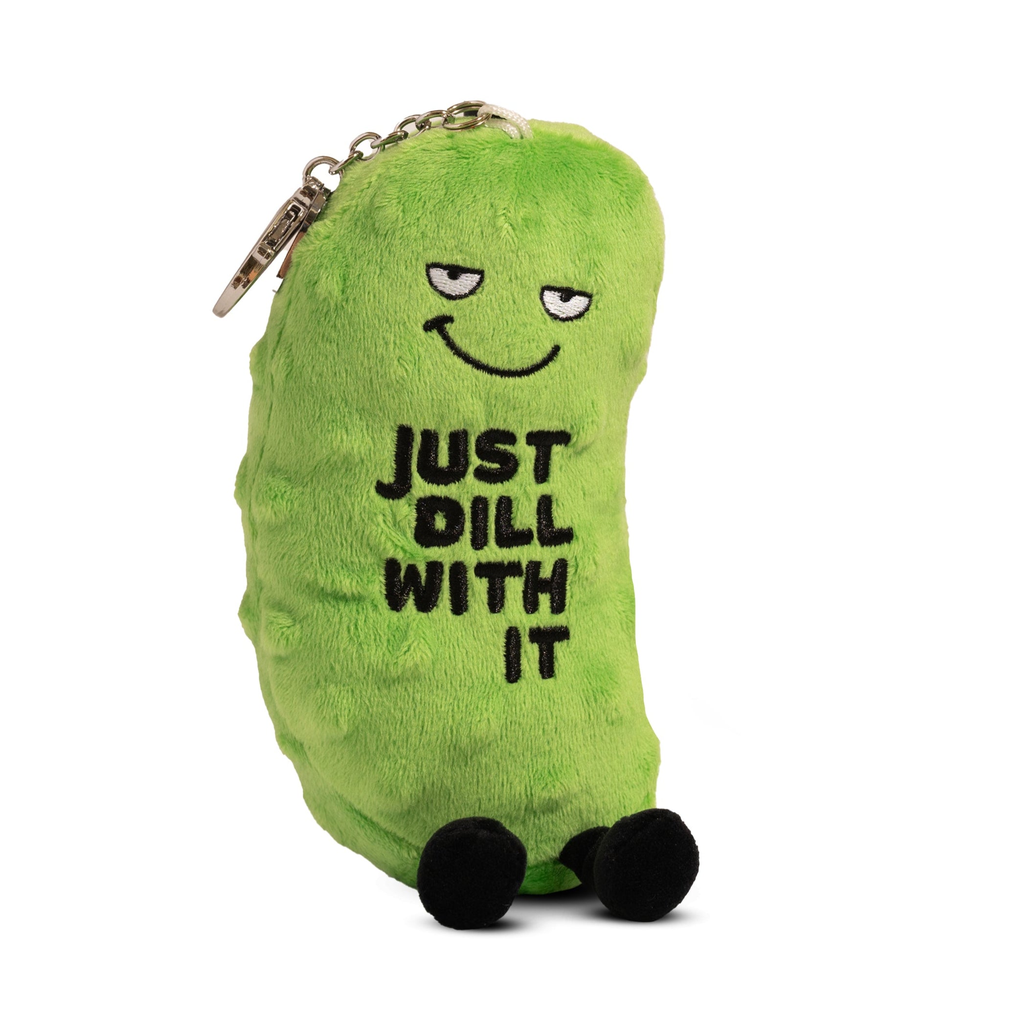 A plush pickle charm with the text 'JUST DILL WITH IT' printed on it.