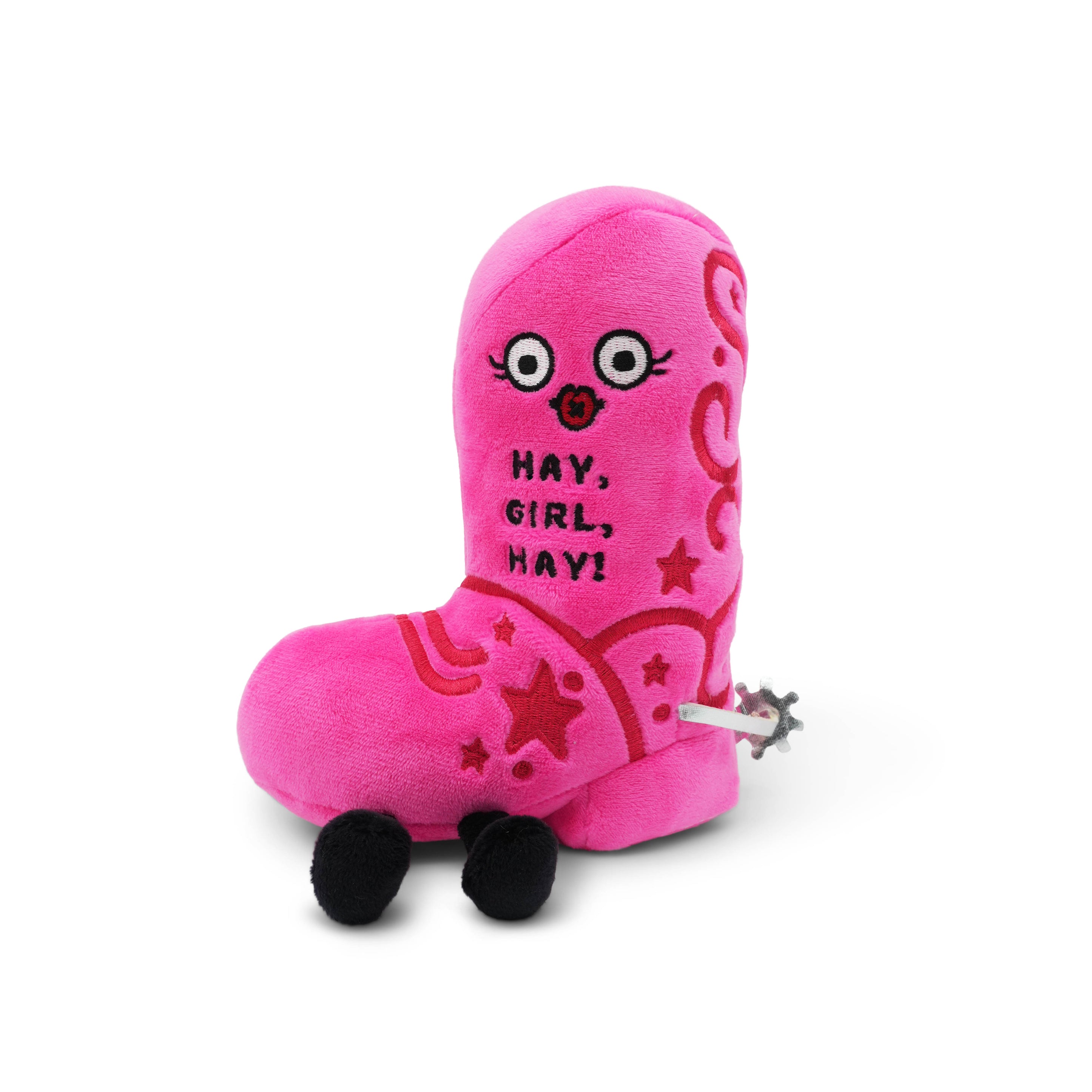 Pink plush toy cowgirl boot with cartoon face and text that reads. "Hay, girl, hay!"