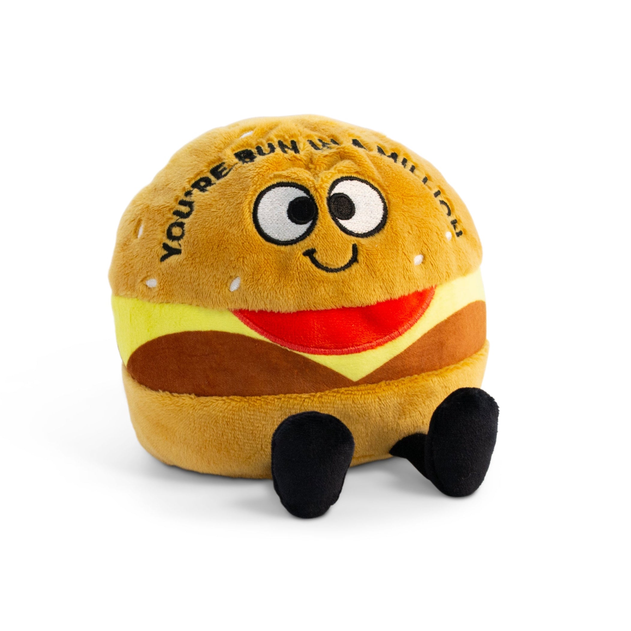 A plush designed to look like a cheeseburger with a smiling face, eyes, and dangly legs. Text on it reads, "You're bun in a million."