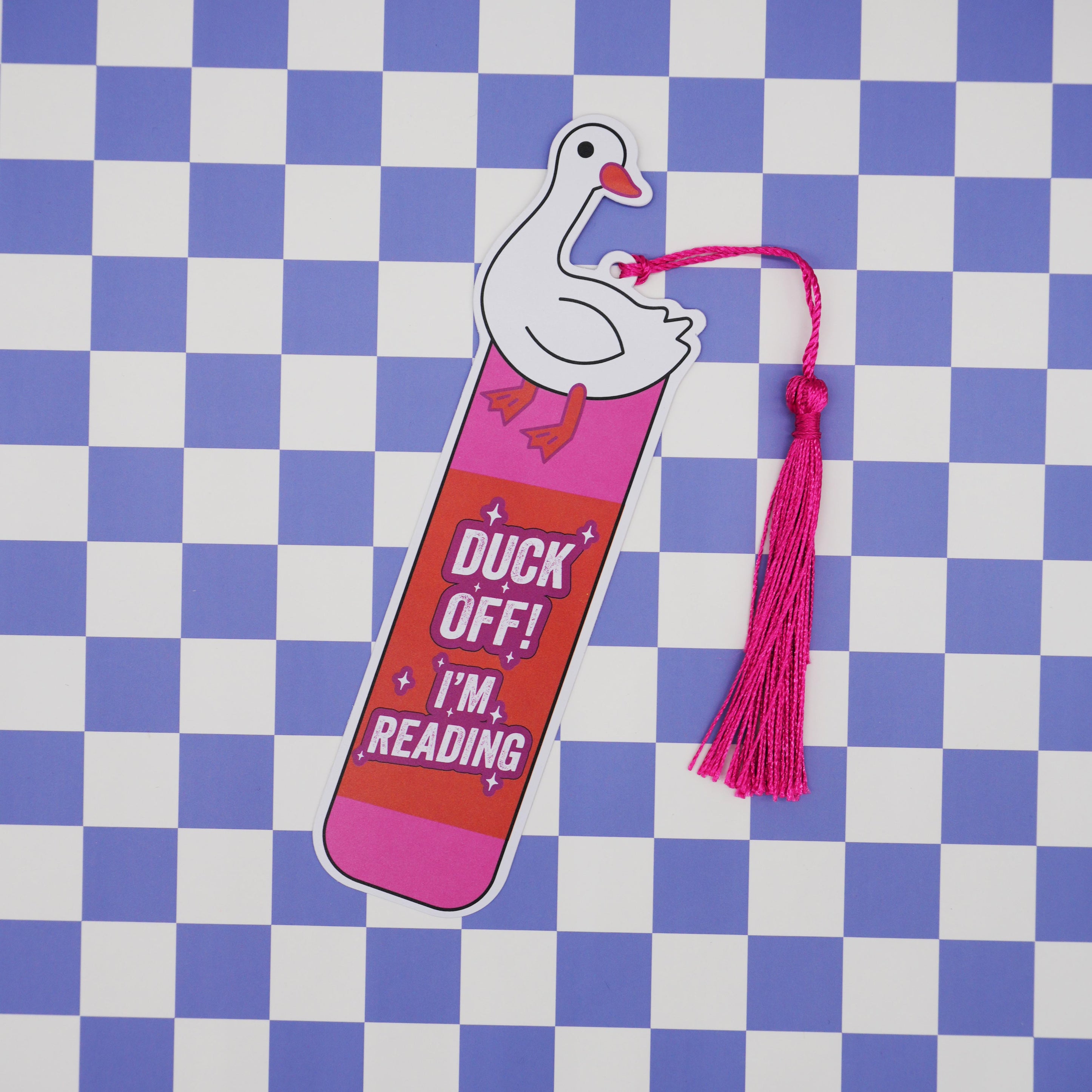 Bookmark with duck design and text on a checkered background