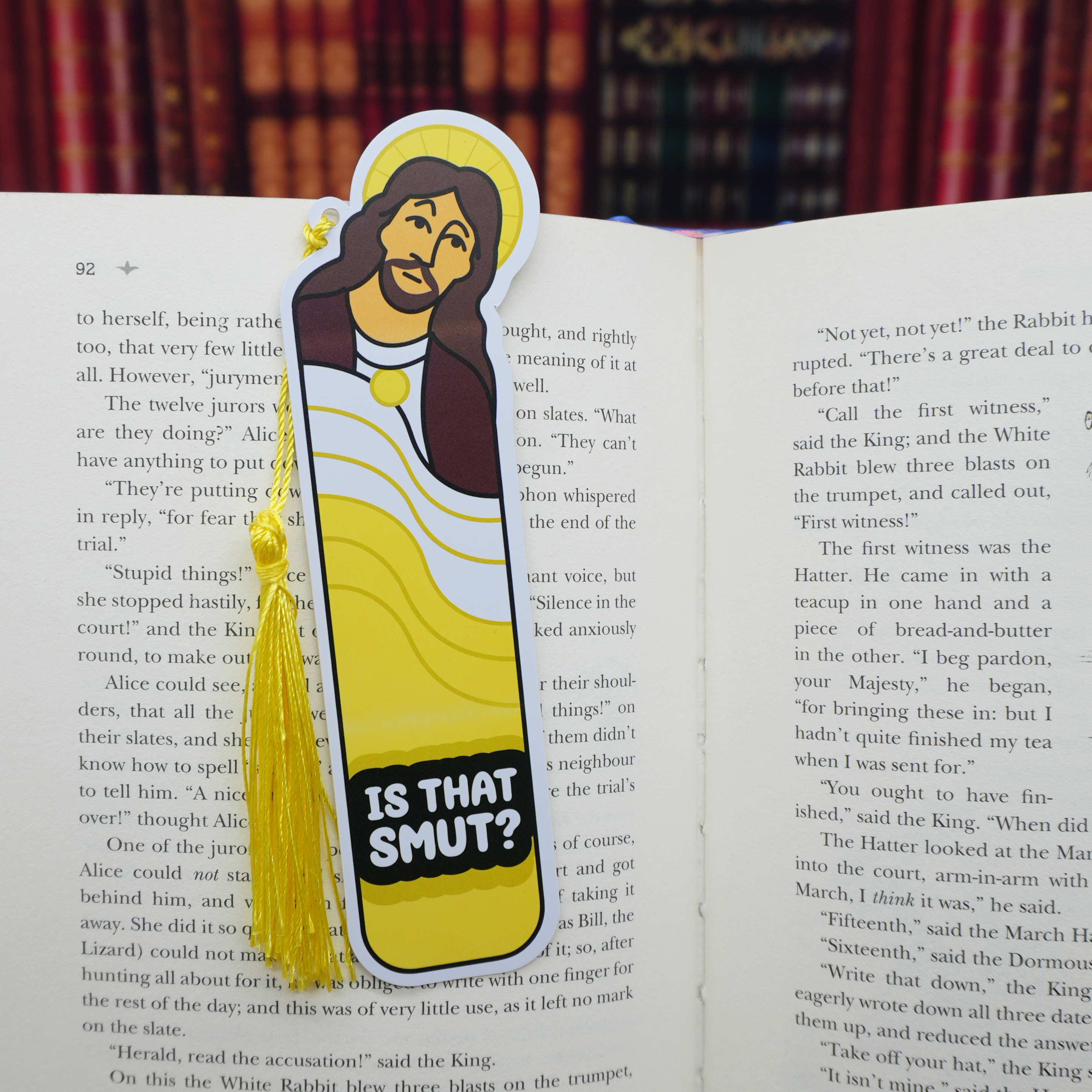 Bookmark with Jesus illustration and 'Is That Smut?' text on an open book