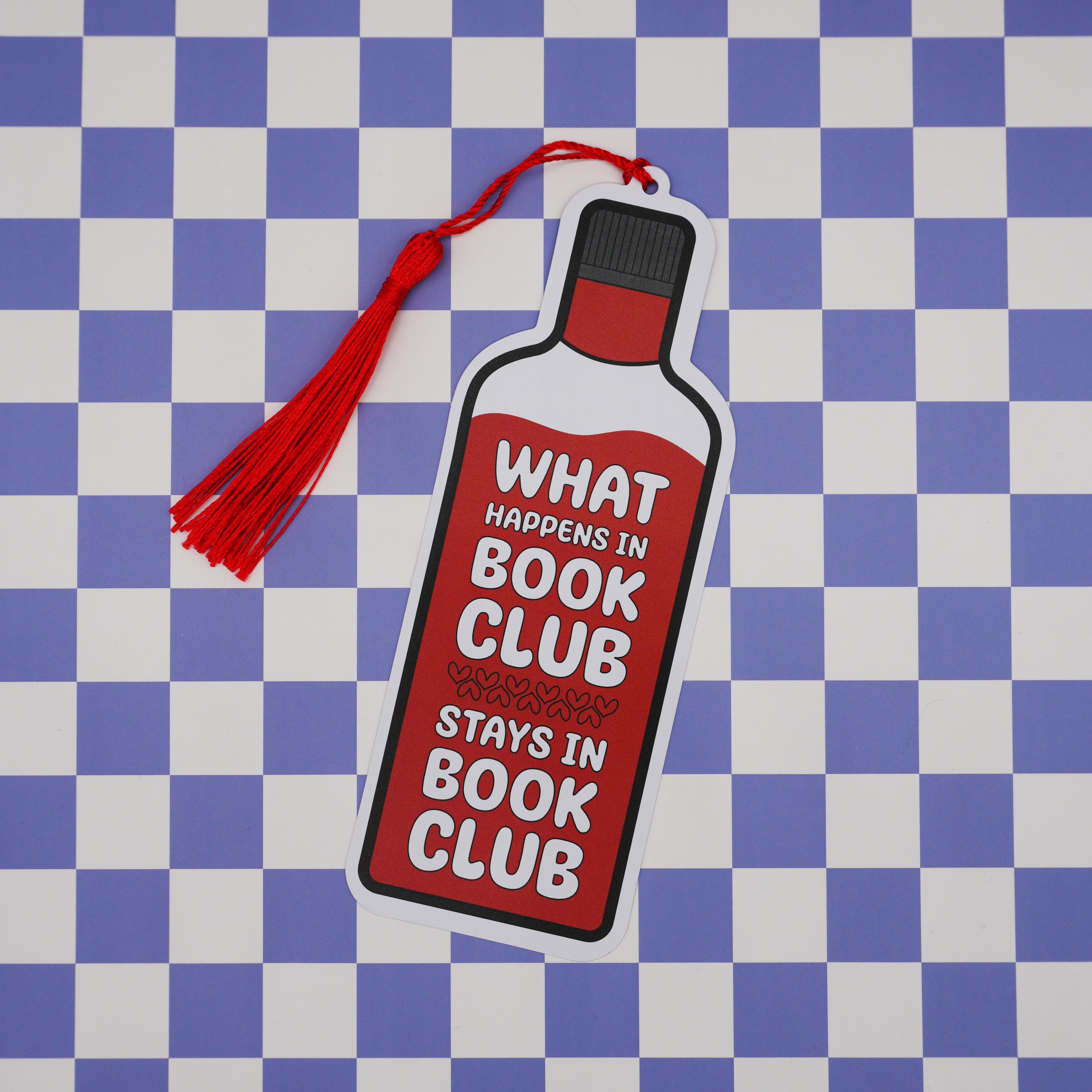 Bookmark shaped like a wine bottle with text on a checkered background