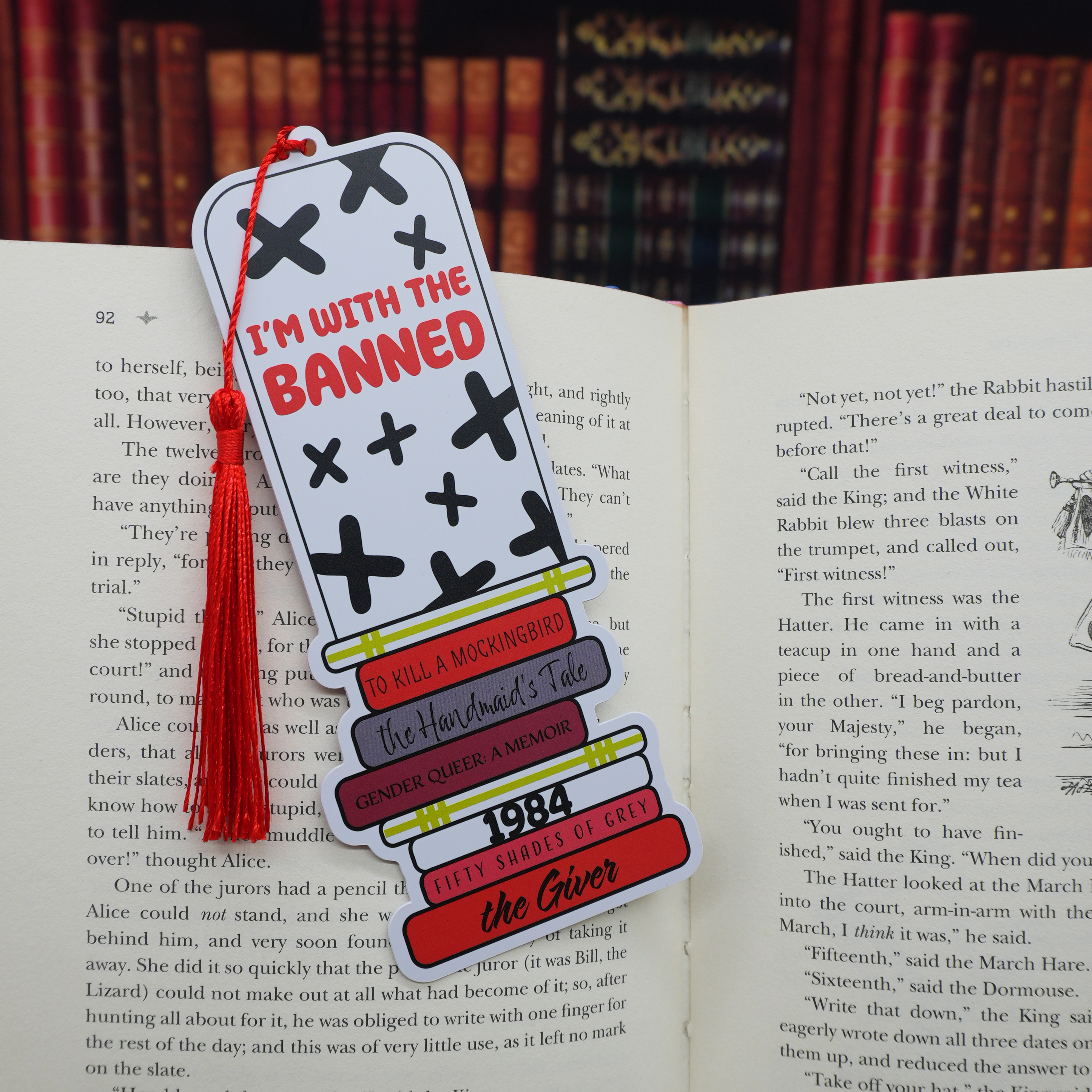 Bookmark with 'I'm with the Banned' design on an open book