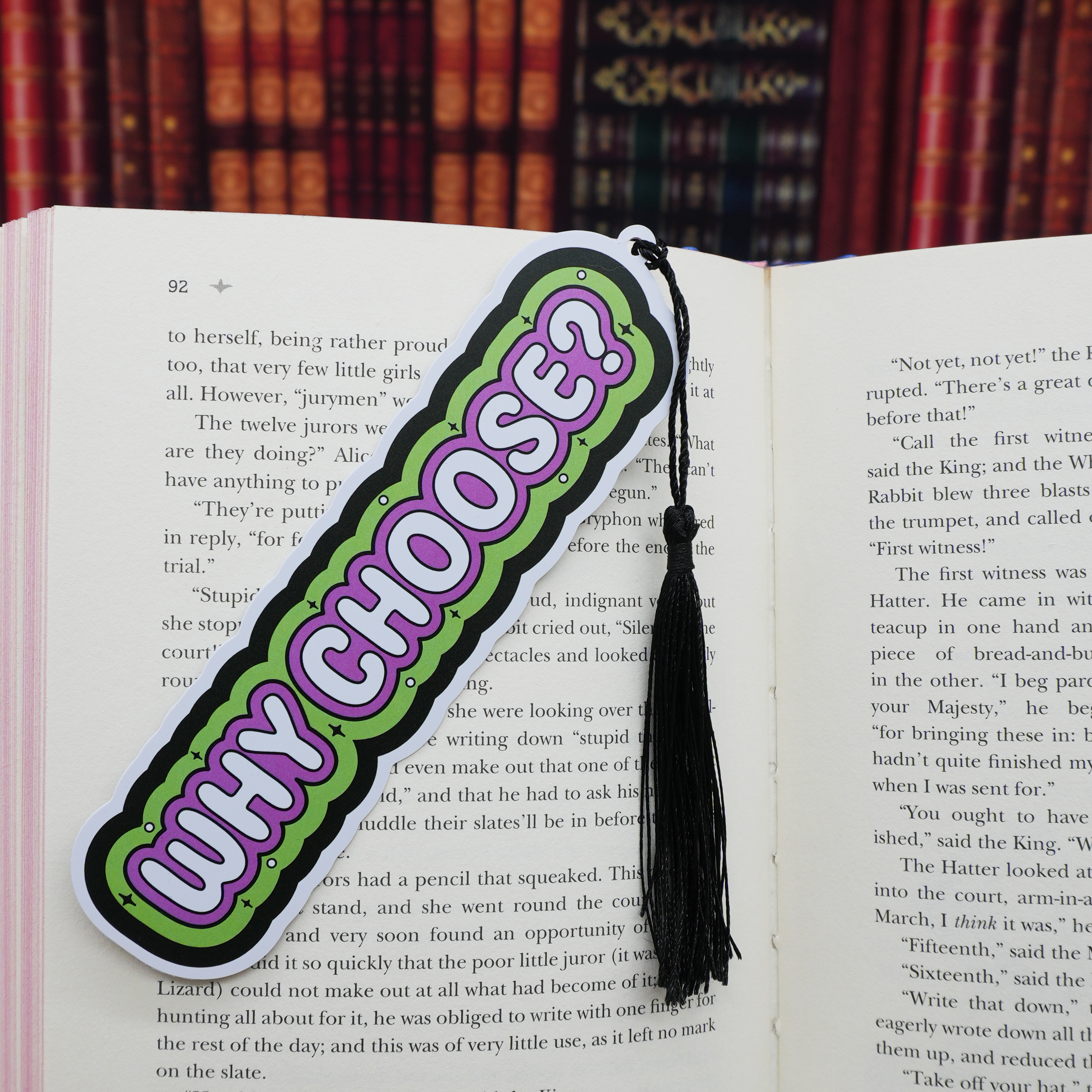Bookmark with 'Why Choose?' text on an open book