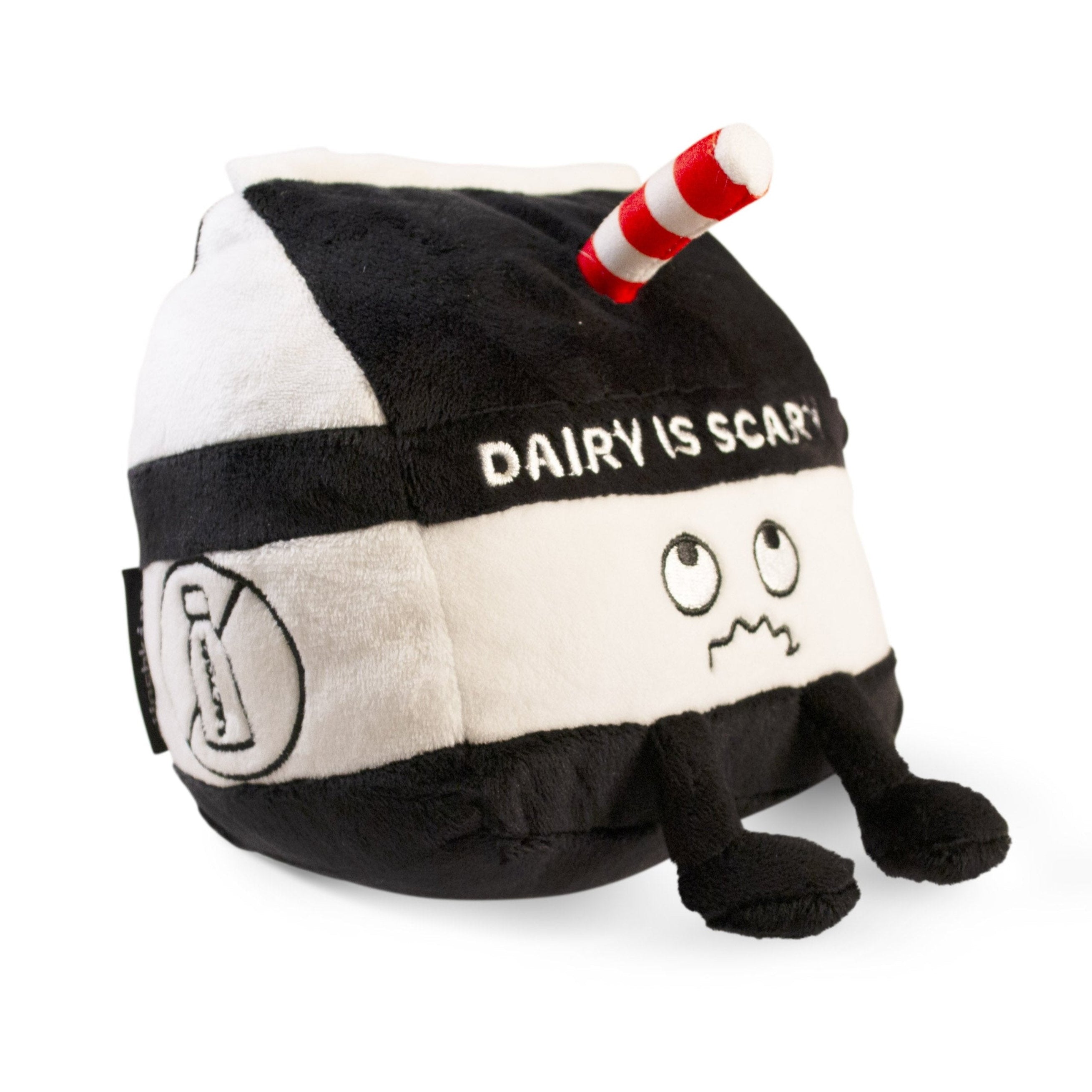 A plush designed to look like a milk carton with a distressed face and the text 'DAIRY IS SCARY' on the front.