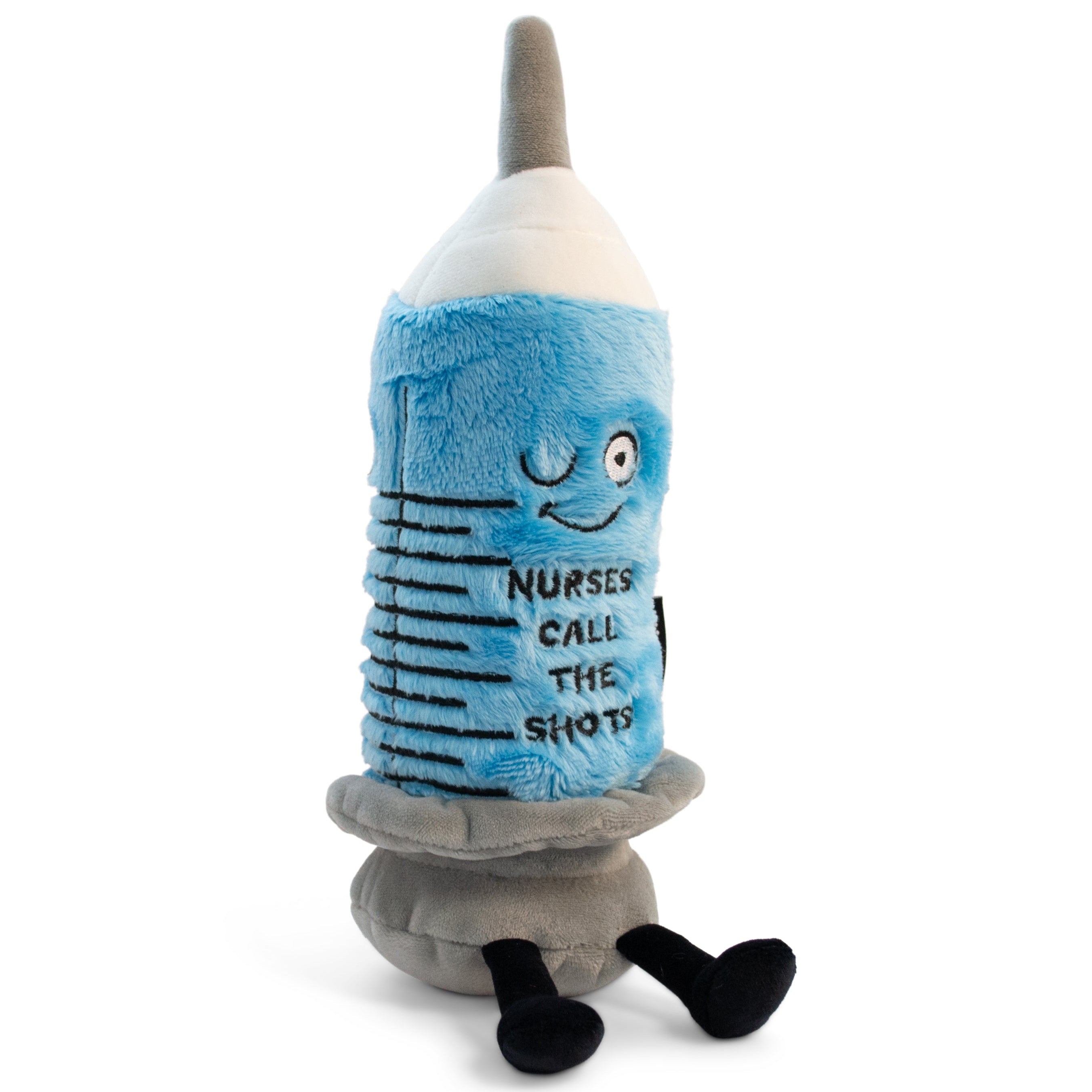 A plush designed to resemble a syringe with a smiling face and the text 'Nurses call the shot' on it, on a white background.