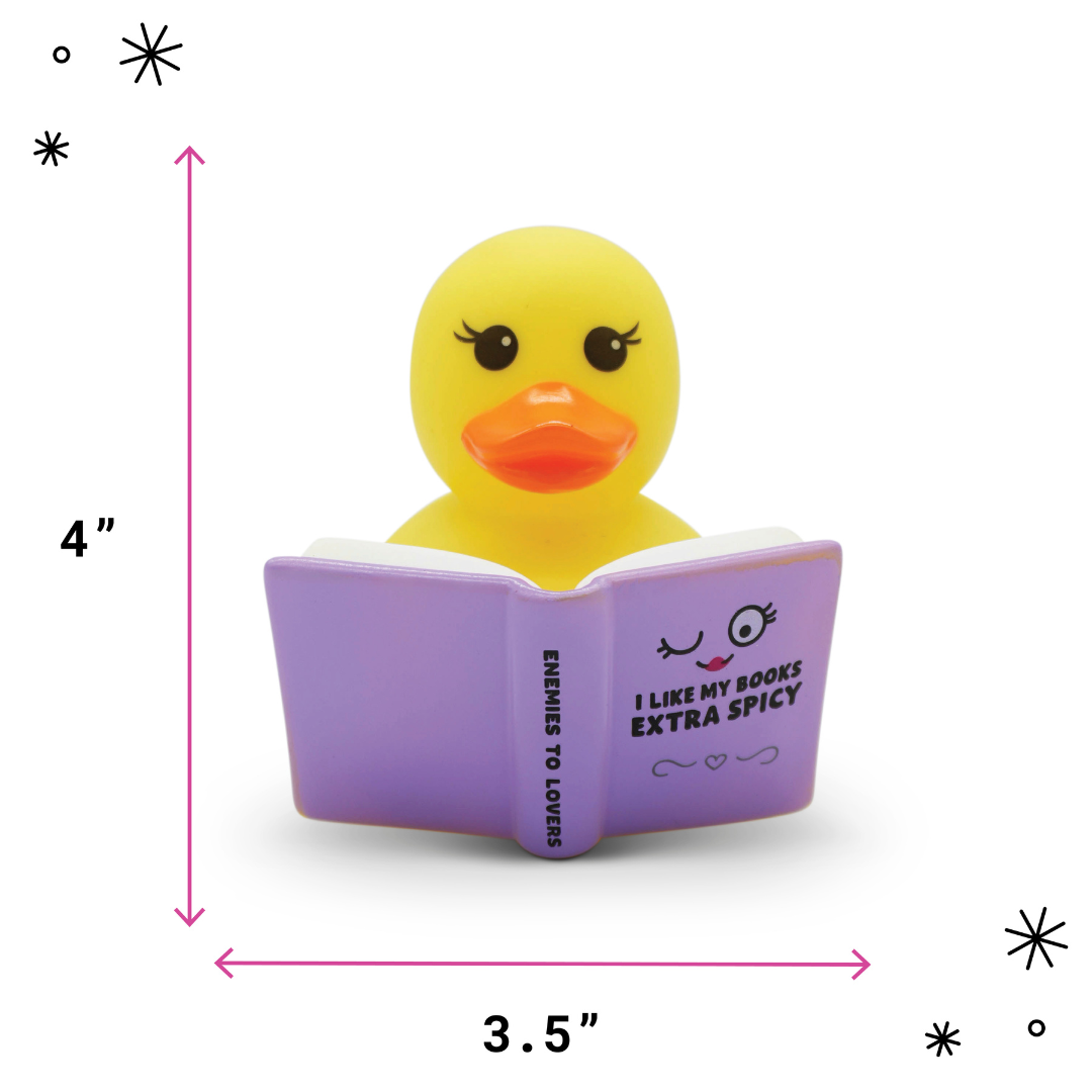 Yellow rubber duck reading a spicy romance book shown with measurements on a white background.