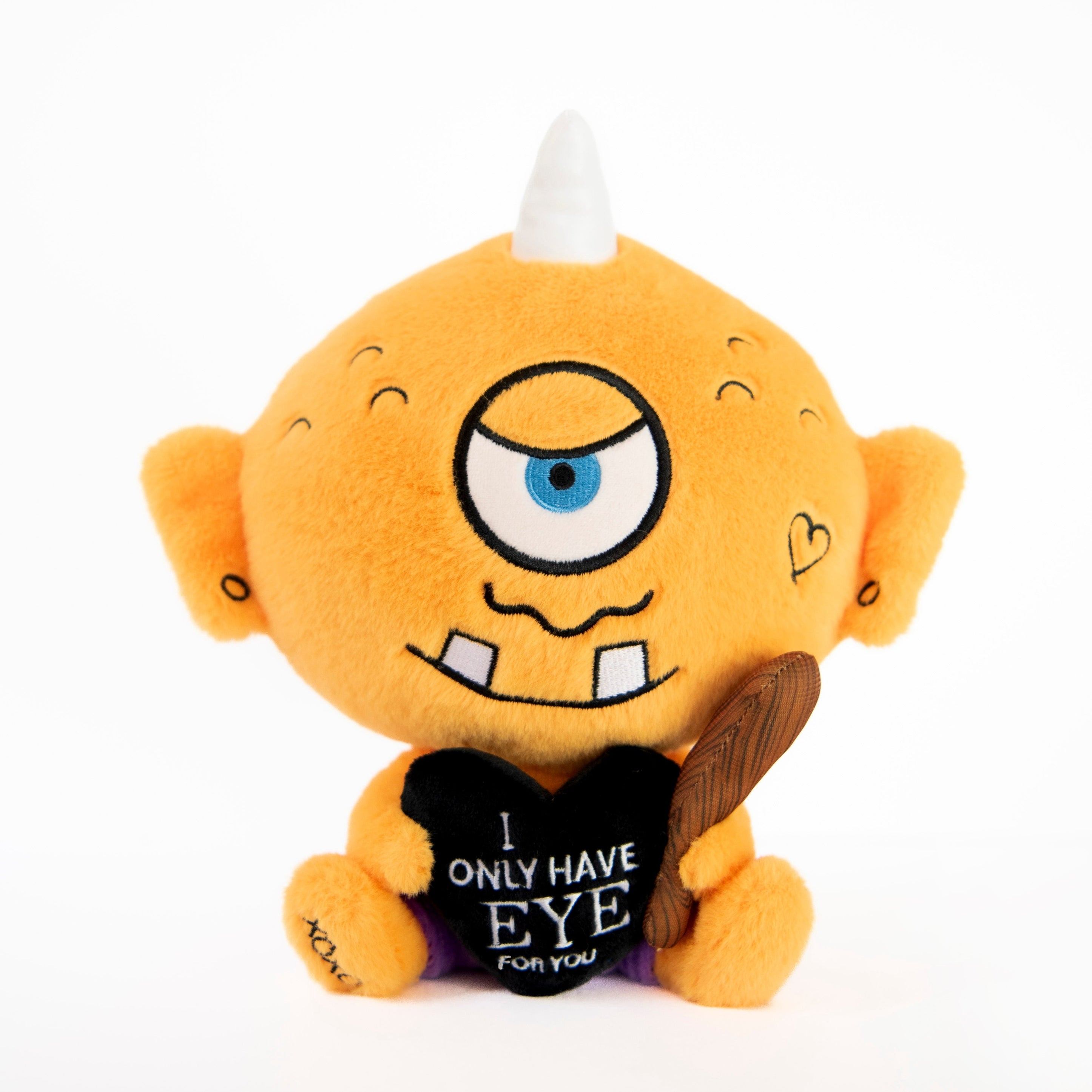 A cyclops plush toy that reads, "I only have eye for you." He's holding a fabric baton.