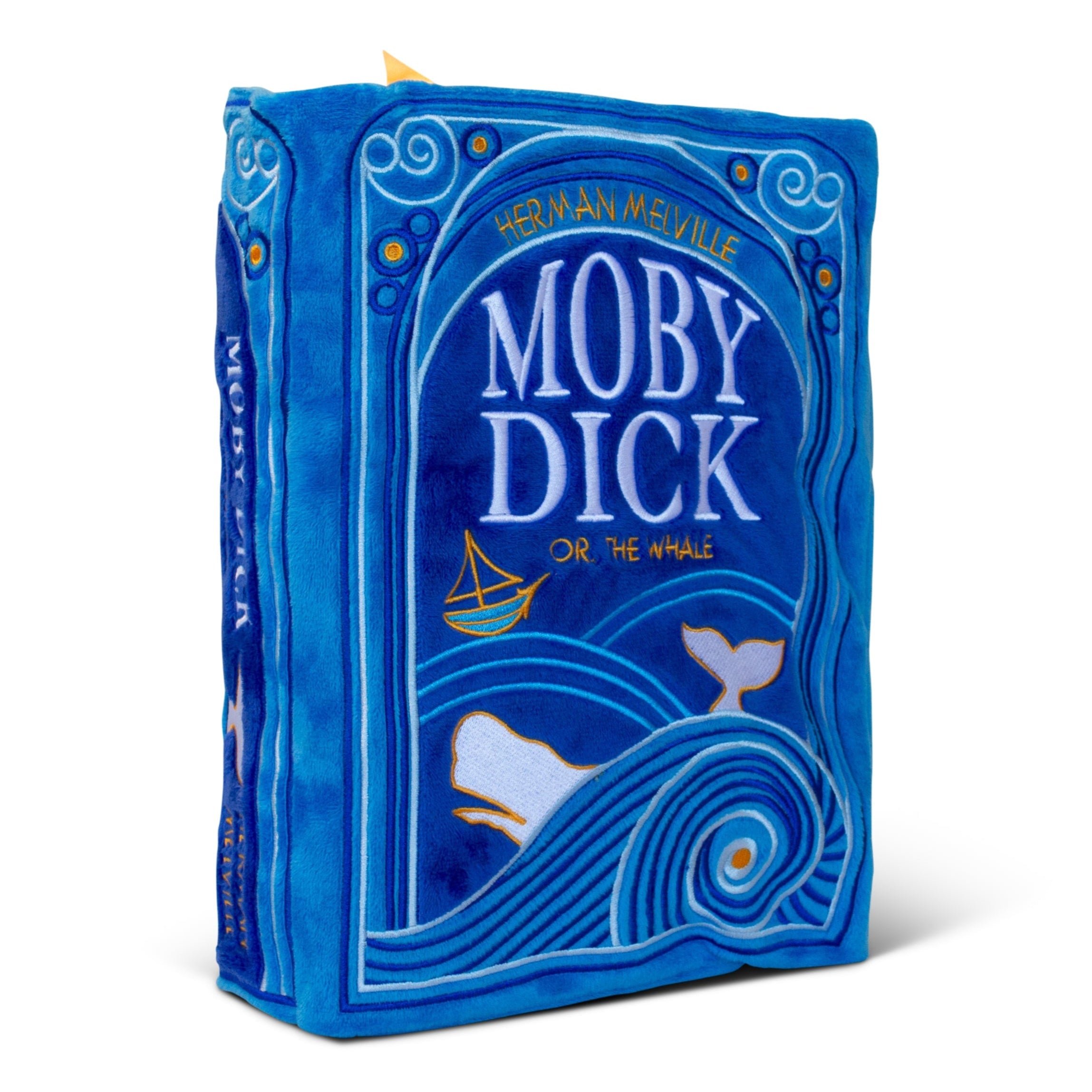 A plush book of 'MOBY DICK' with an ocean scene embroidered on the cover