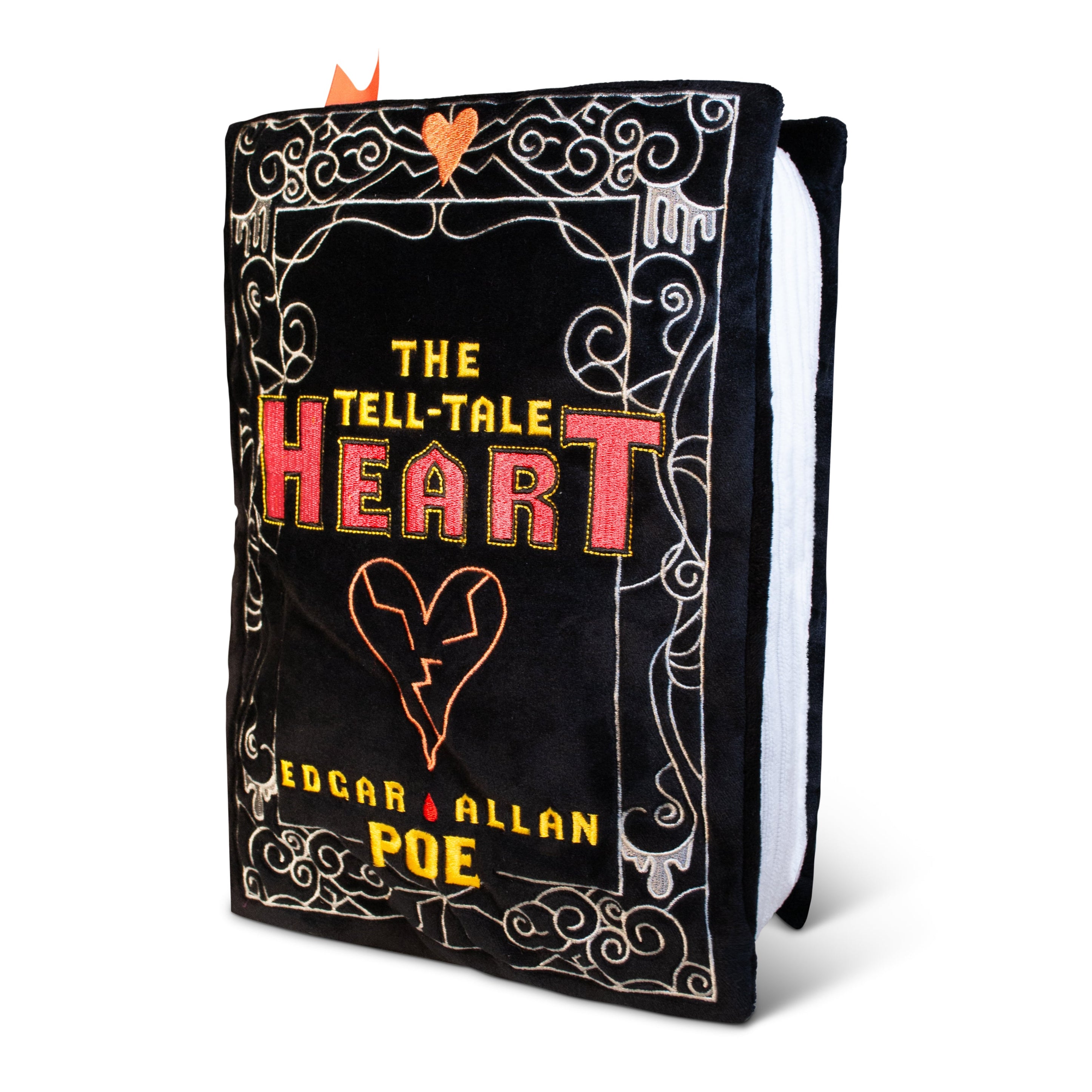 This book plushie features a black cover with embroidery of a heart and the title 'The Tell-Tale Heart' by Edgar Allan Poe.