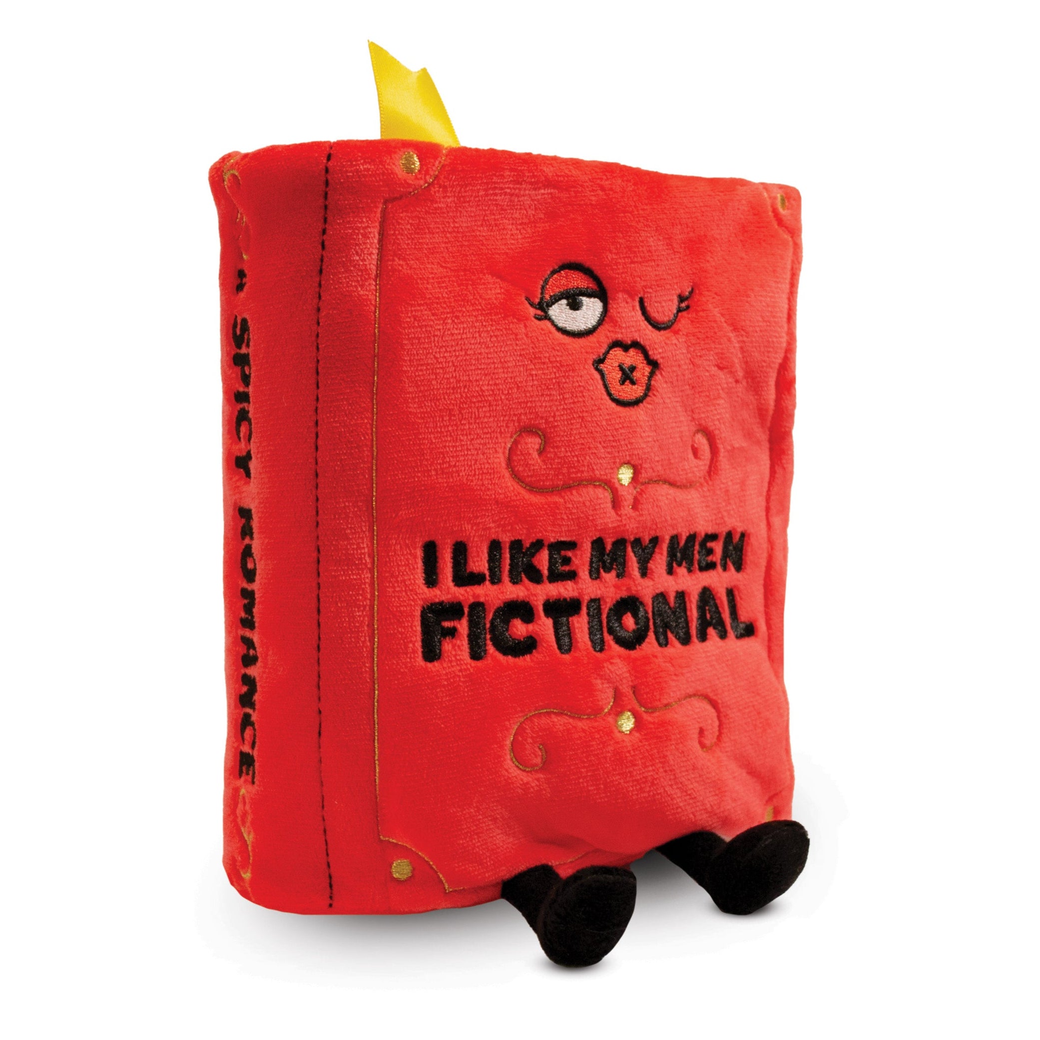 A plush designed to look like a red book with 'I LIKE MY MEN FICTIONAL' printed on the cover. The plush has a face and a pair of legs.