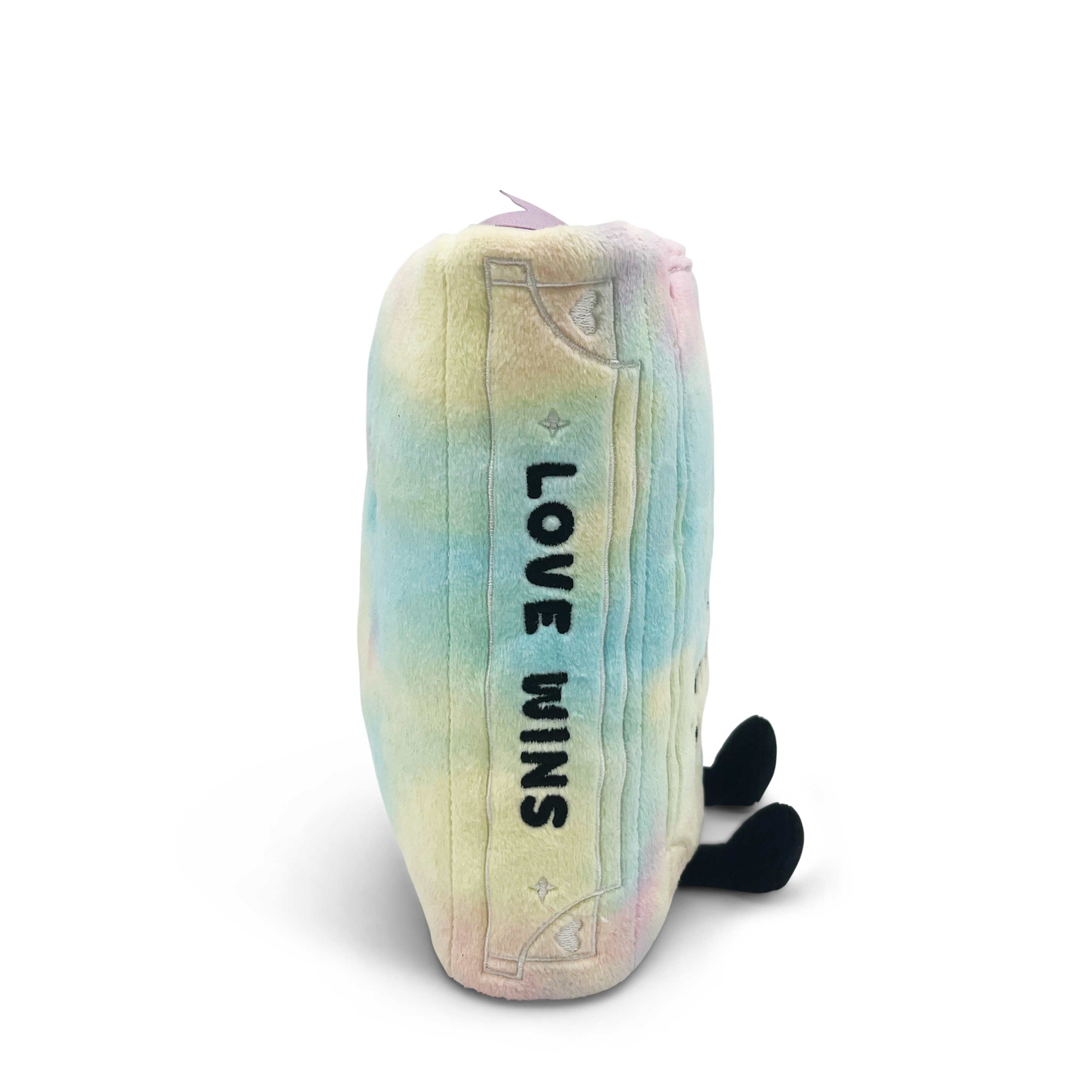 Plush book with tie-dye pattern and 'LOVE WINS' text  written on the spine on a white background