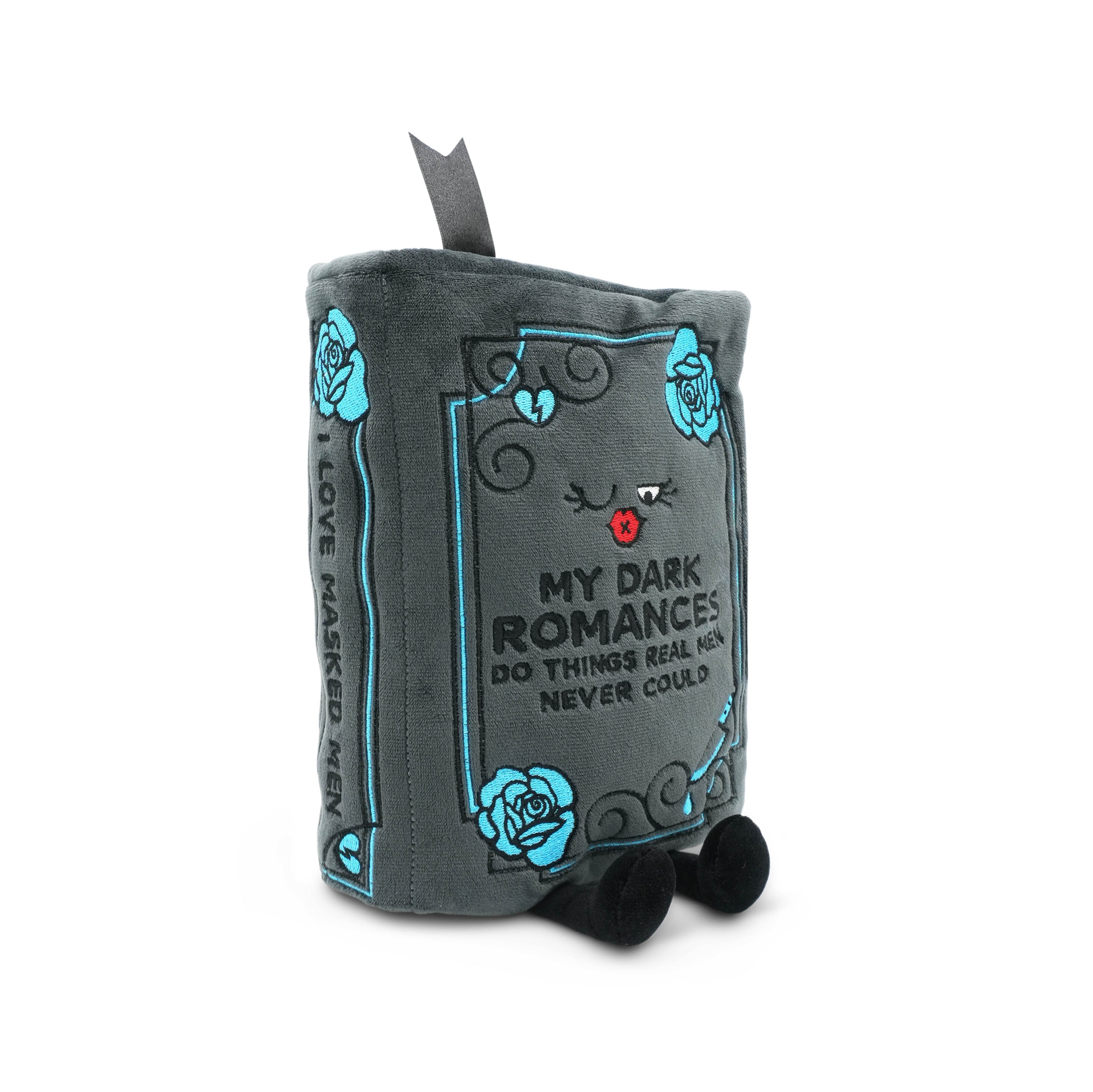 Book-shaped plush with text and decorative elements on a white background