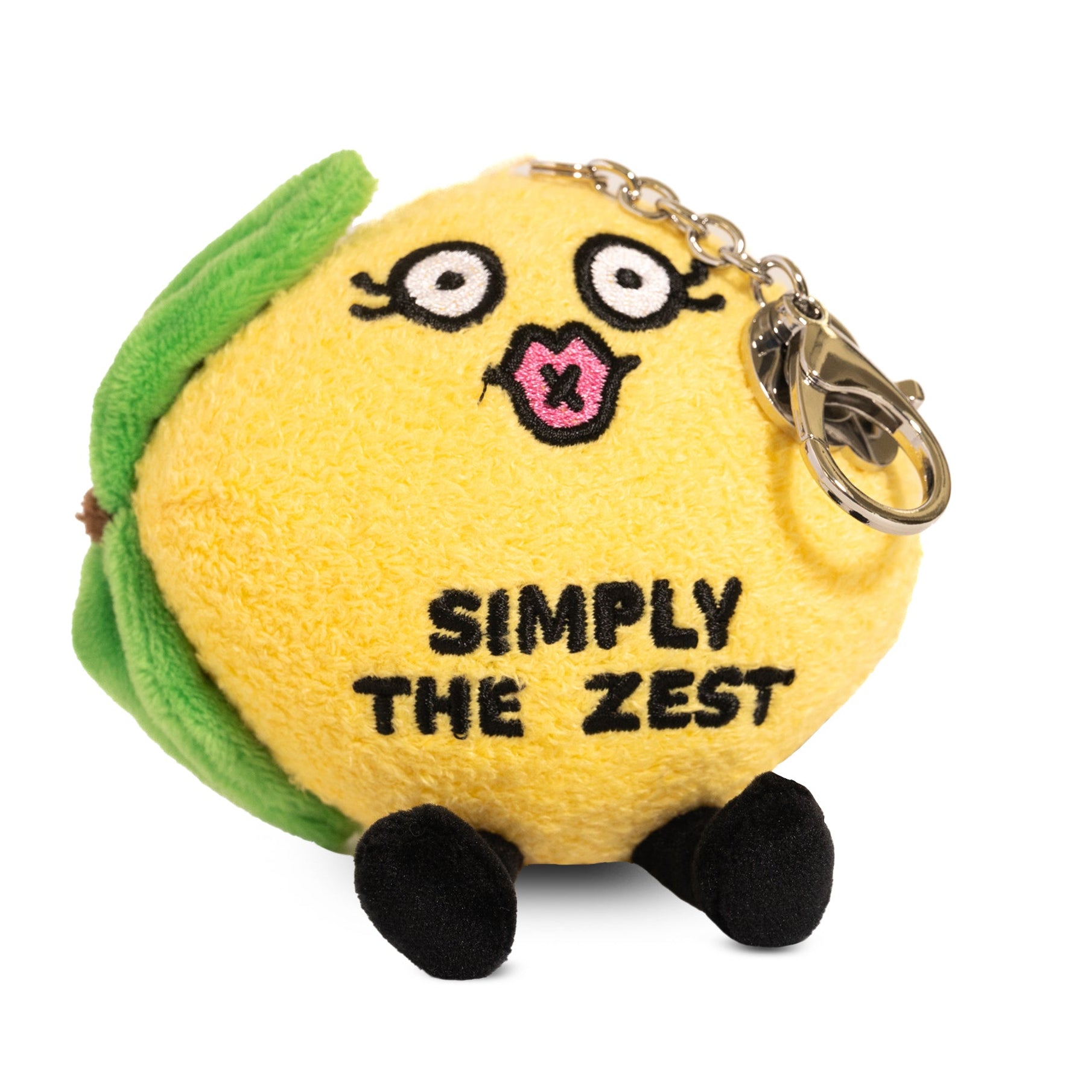 A plush lemon bag charm with a face, legs, and the text 'SIMPLY THE ZEST' printed on the side.