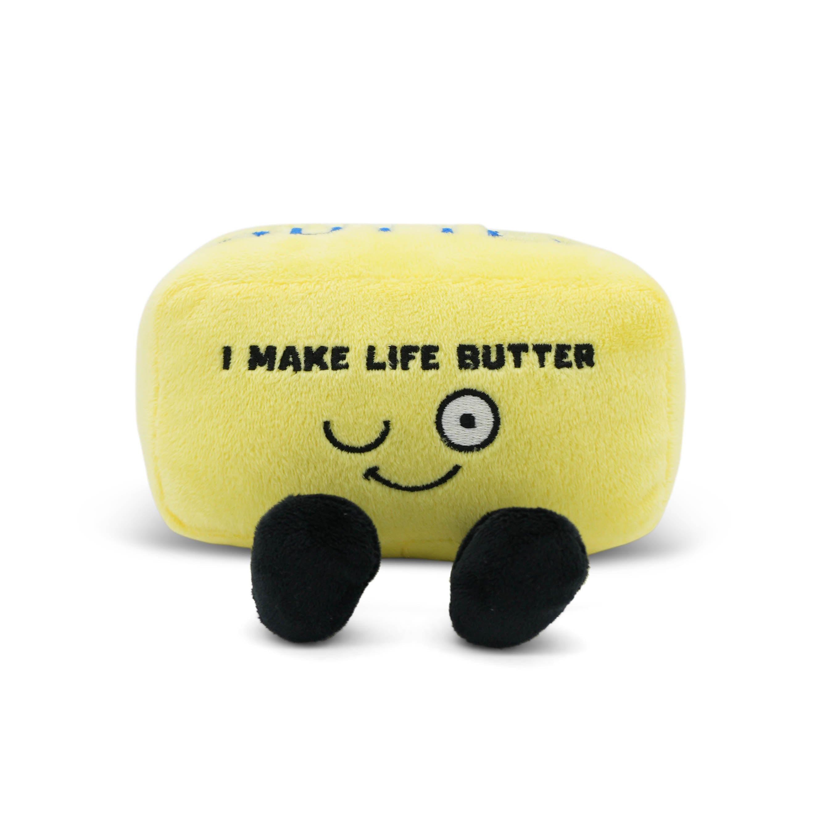 Plush butter block toy with a smiley face and text 'I MAKE LIFE BUTTER' on a white background.