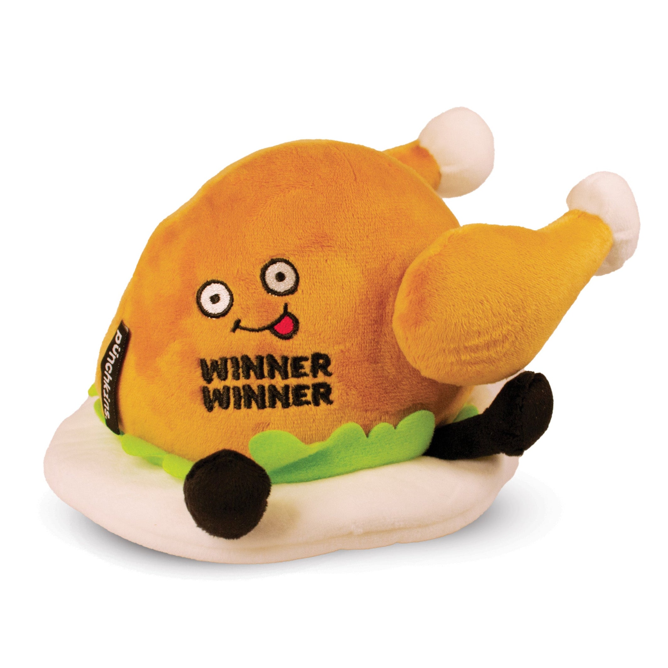 A plush designed to look like a roasted chicken with a 'Winner Winner' text on its chest and cartoonish facial features.