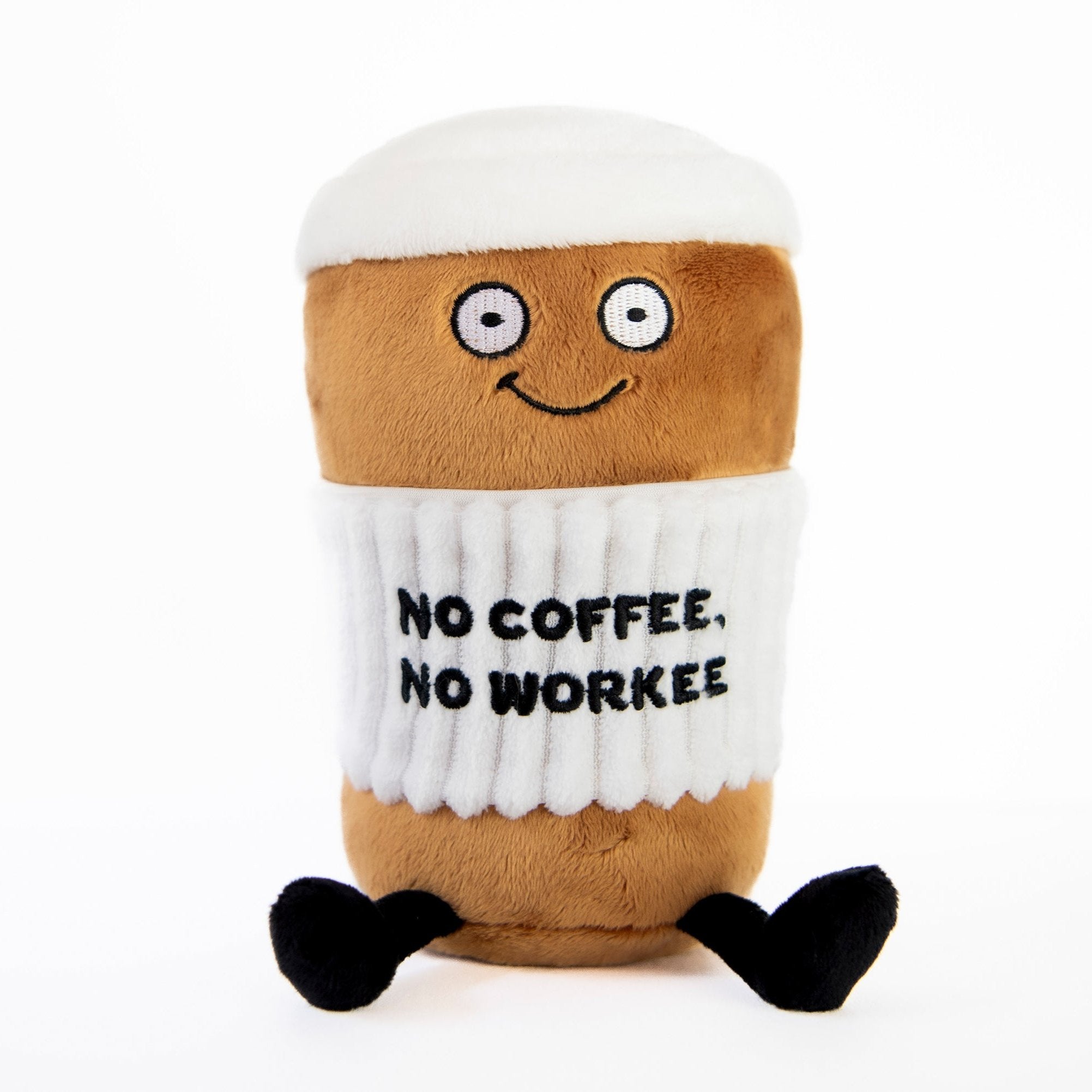 A plushie designed to look like a takeout coffee cup with a face and text that says 'NO COFFEE. NO WORKEE' on it.