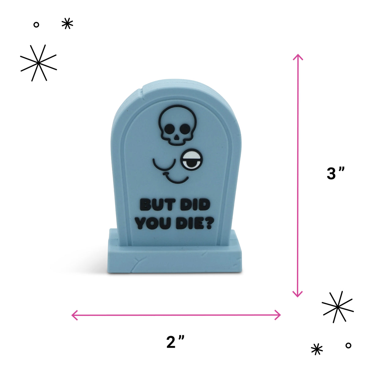 A small light blue tombstone-shaped novelty item with a skull and eye graphic and the text 'BUT DID YOU DIE?' on a white background, with pink dimension arrows showing 2 inches wide by 3 inches tall.