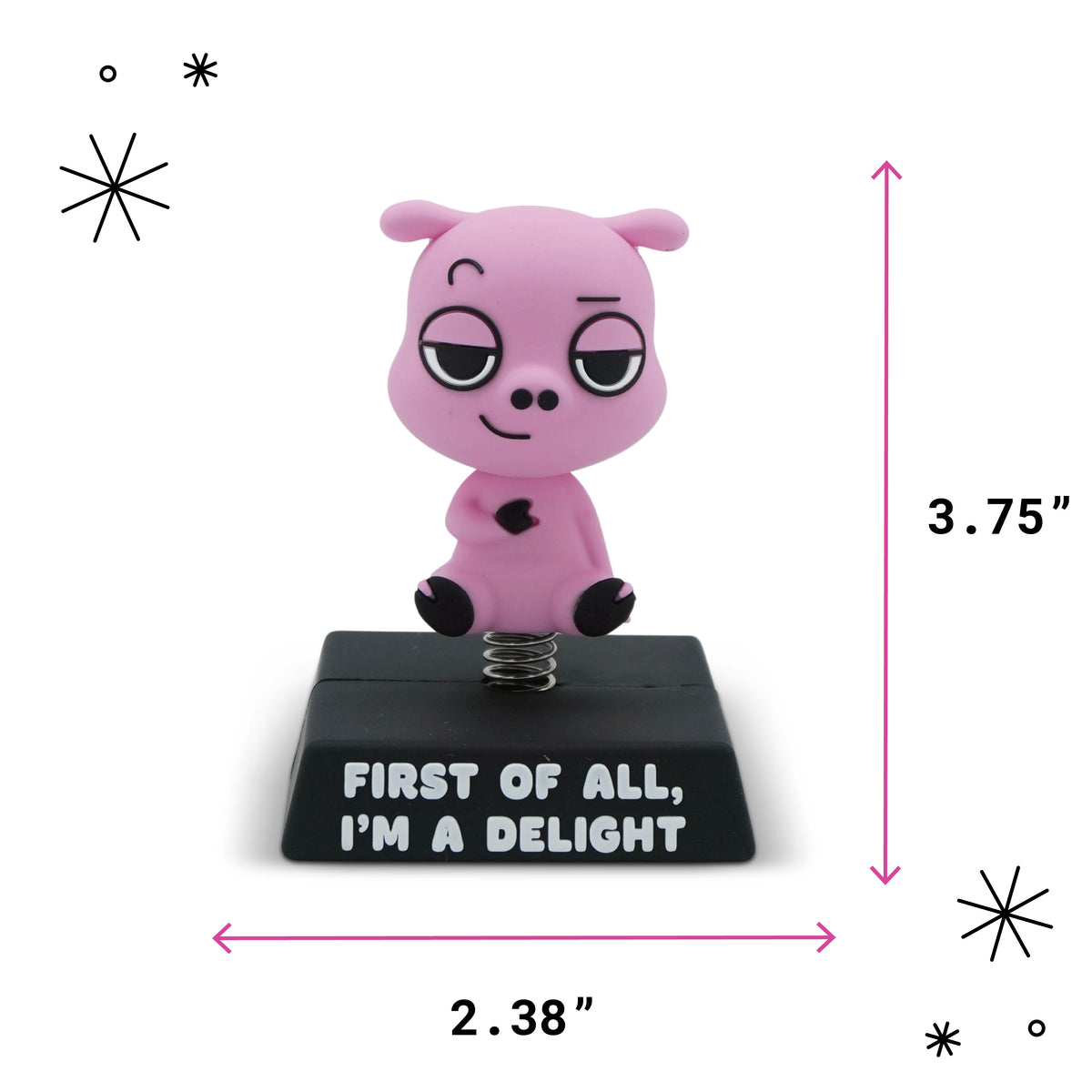 A pink cartoon pig figurine sitting on a black rectangular base with white text reading 'FIRST OF ALL, I'M A DELIGHT.' The image includes dimension arrows and measurements showing the product is 3.75 inches tall and 2.38 wide.