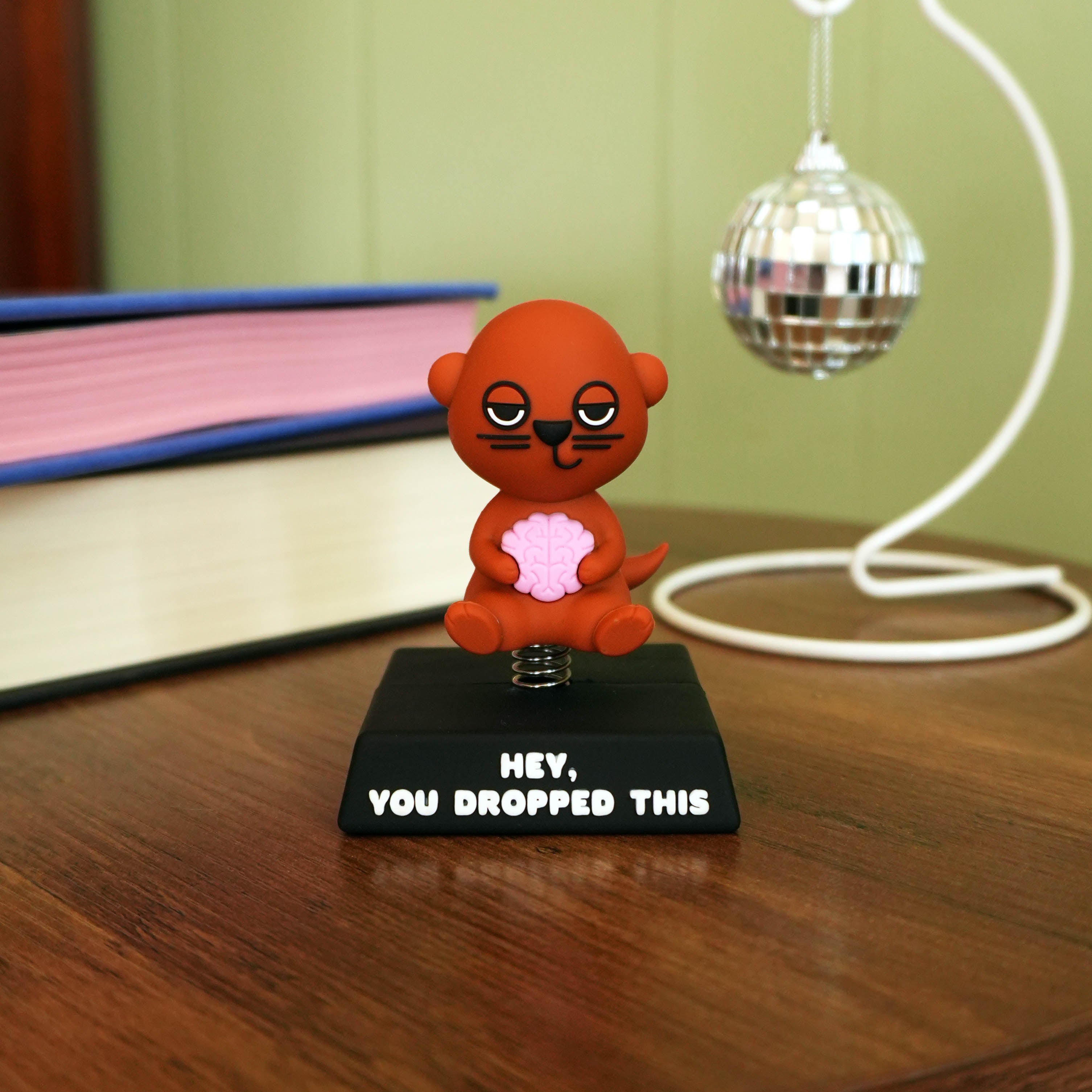 "Hey, You Dropped This" Otter Spring Bobblehead