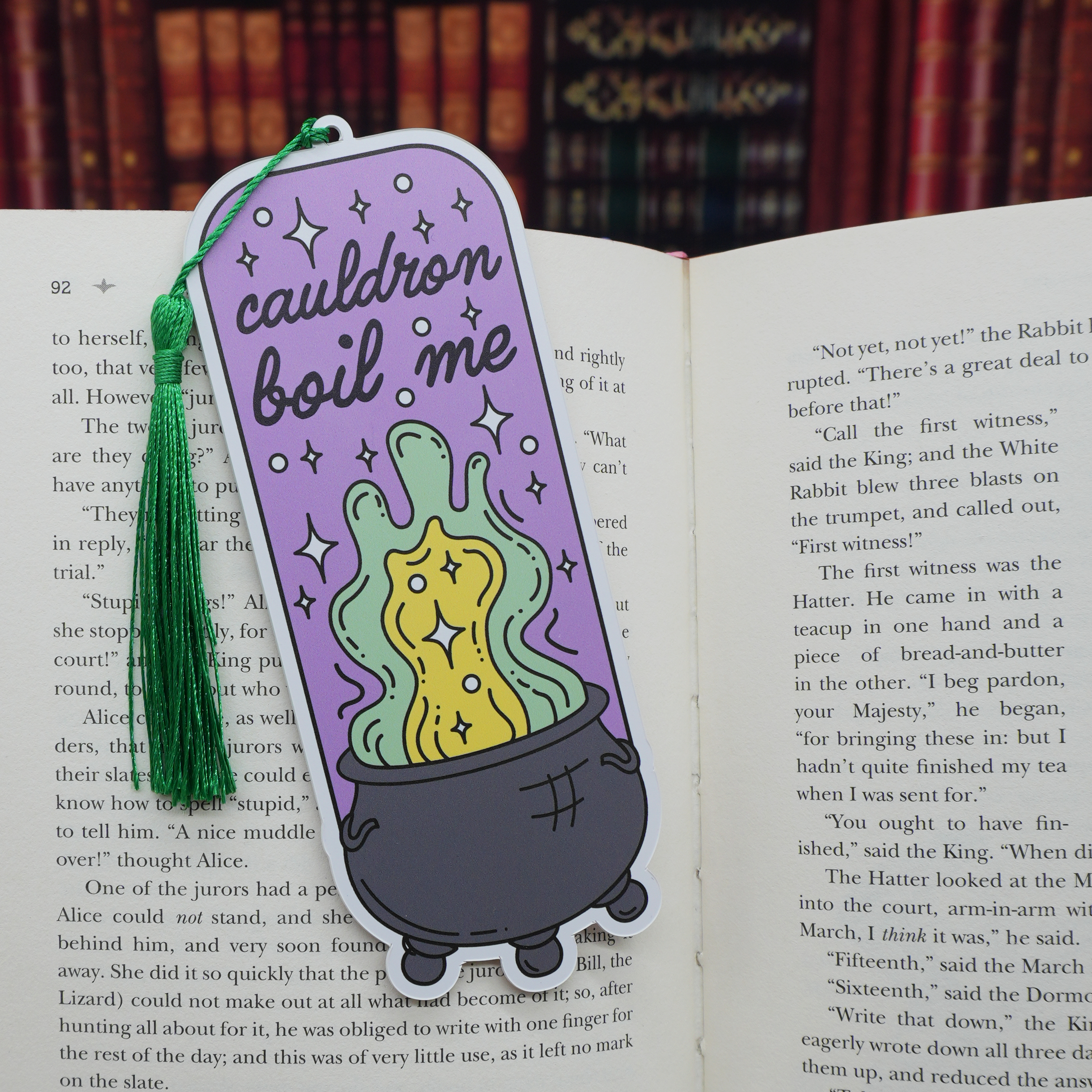 Bookmark with a cauldron boil me design on an open book