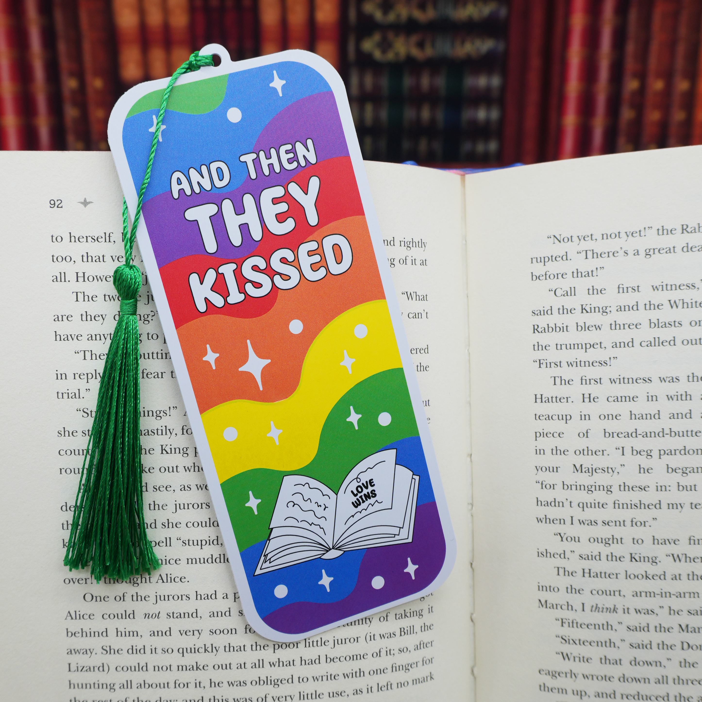 Colorful bookmark with 'And Then They Kissed' text on an open book