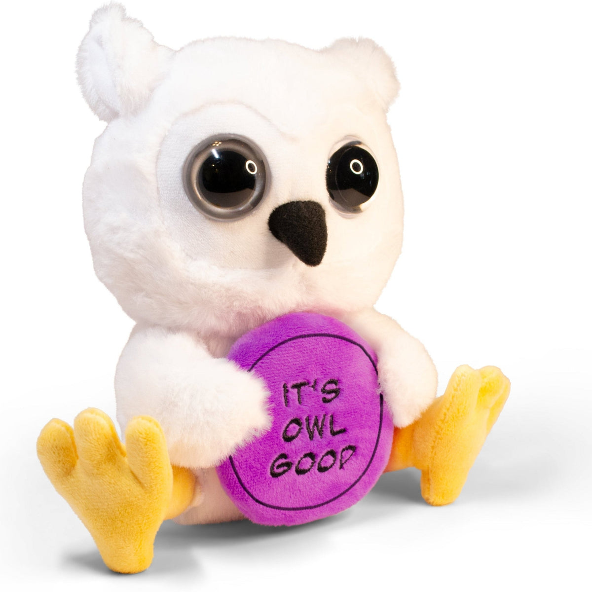 A plush depicting an owl with large 3D eyes, holding a purple circular object with the text 'IT'S OWL GOOD'.