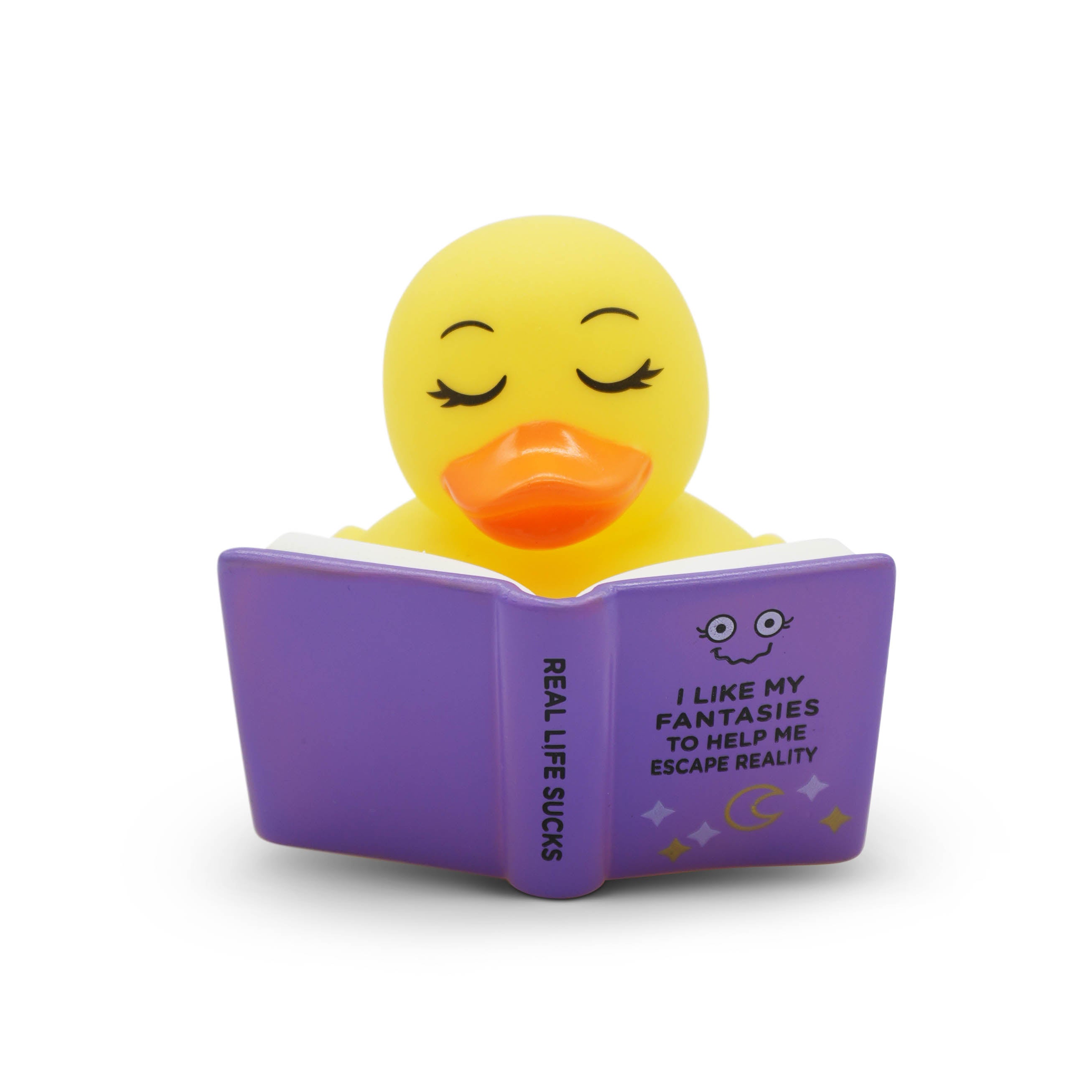 Yellow rubber duck reading a fantasy book on a white background
