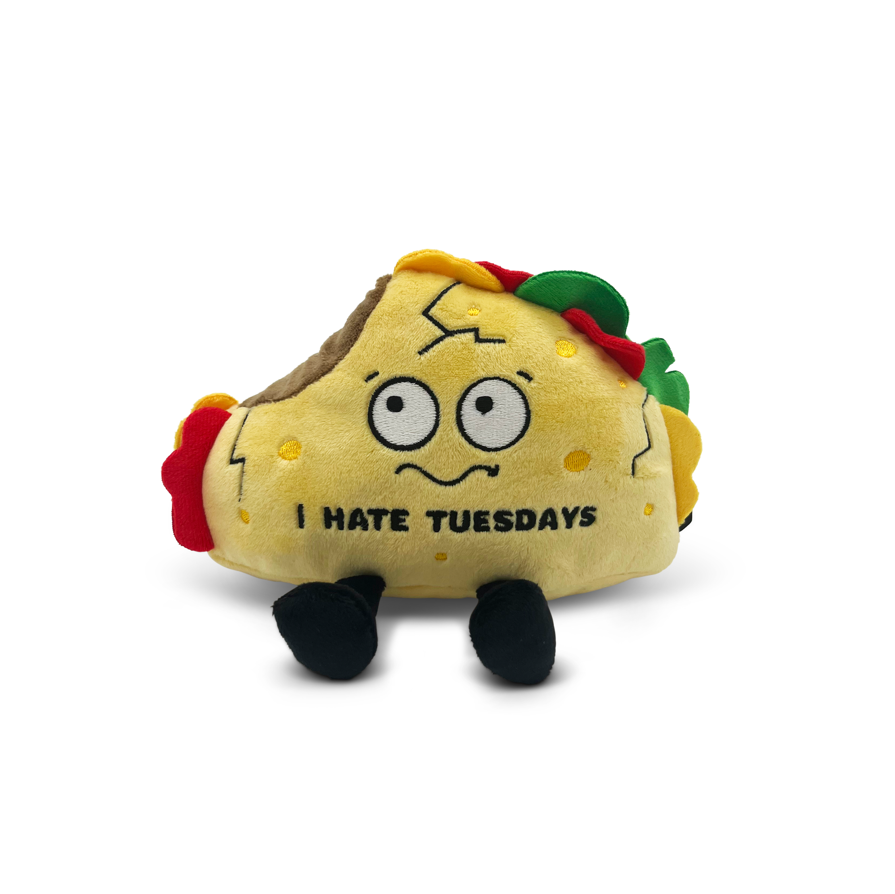 A plush taco with a face, eyes, and the text 'I HATE TUESDAYS' embroidered on it. 