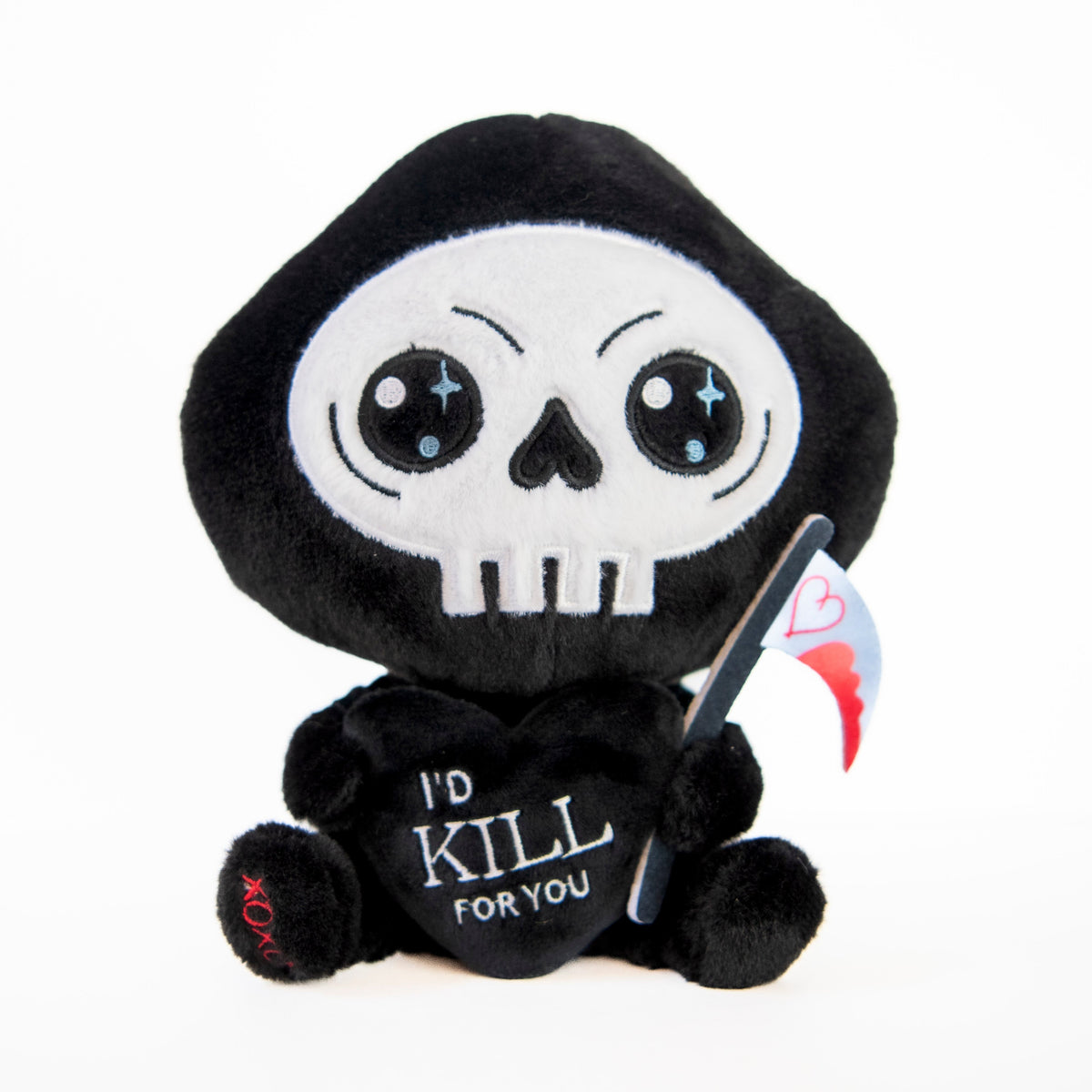 A plush toy resembling a grim reaper with a bloody scythe, embroidered details, and the text 'I'd kill for you' on a heart-shaped tag.