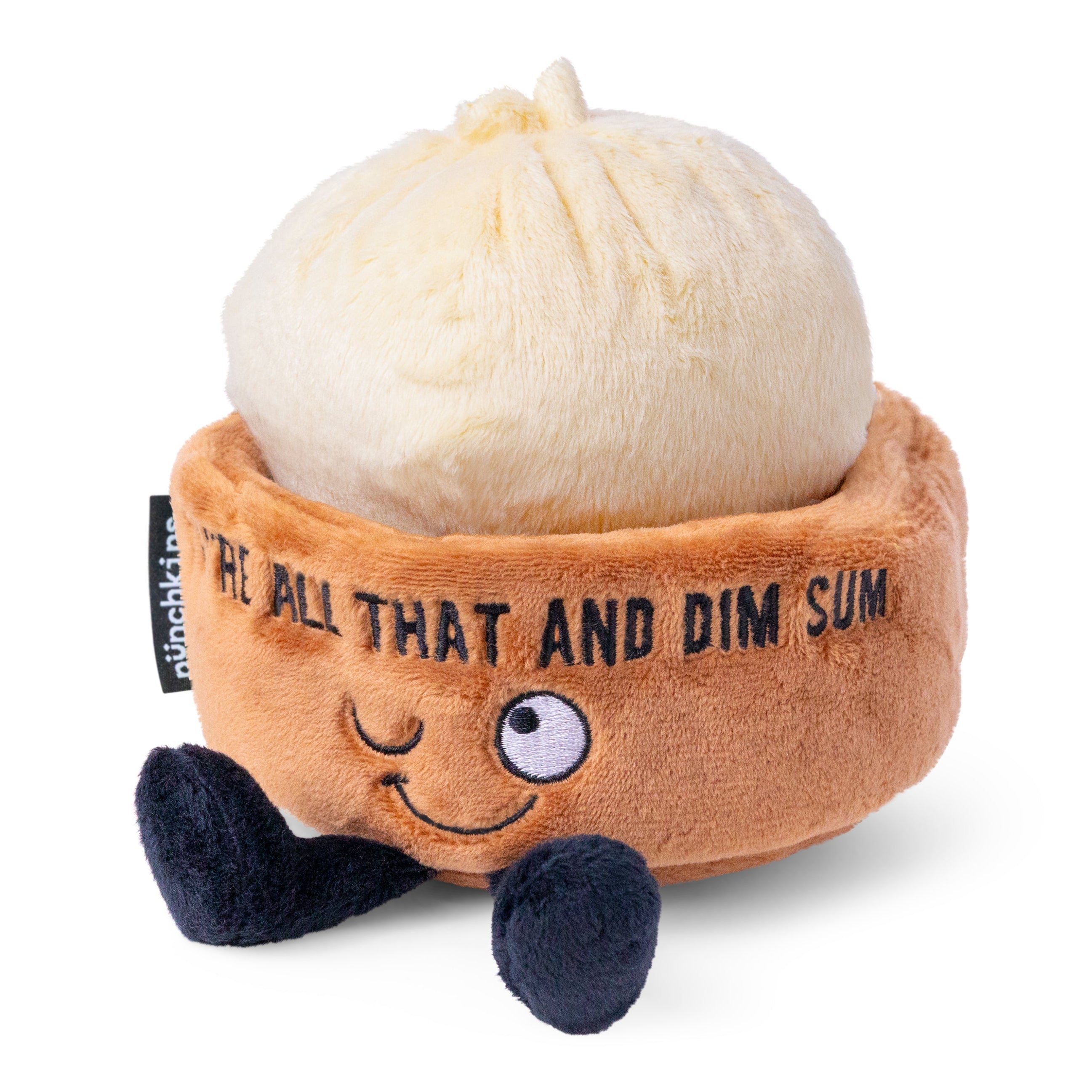 A plush dim sum soup dumpling with a smiling face and dangling legs.
